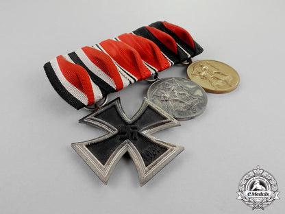 germany._an_ek2_medal_bar_with_three_medals,_awards,_and_decorations_c18-669