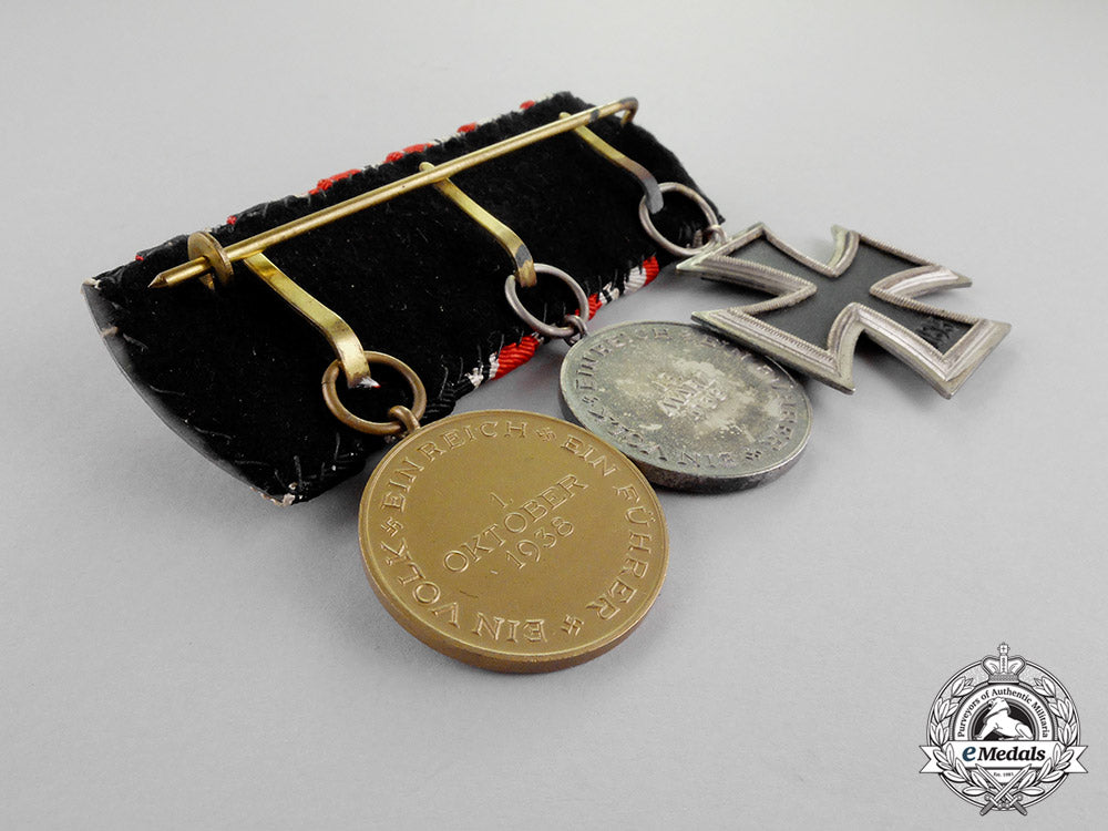 germany._an_ek2_medal_bar_with_three_medals,_awards,_and_decorations_c18-670