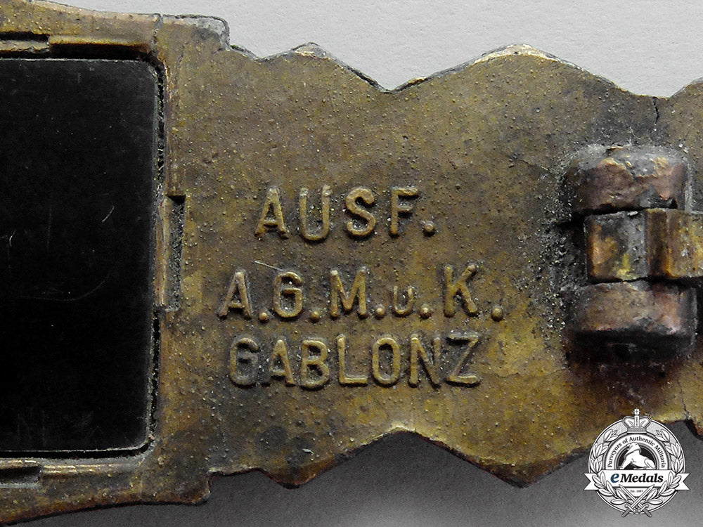 germany._a_bronze_grade_close_combat_clasp_by_a.g.m&_k,_large_font,_type_i_c18-718