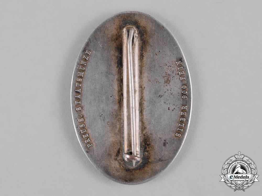 germany,_third_reich._a_fire-_fighting_service_badge,_c.1934_c19-0681