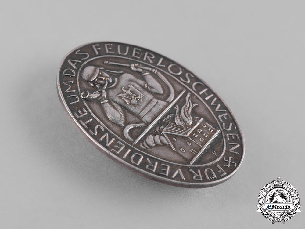 germany,_third_reich._a_fire-_fighting_service_badge,_c.1934_c19-0682