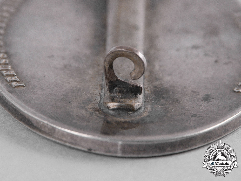 germany,_third_reich._a_fire-_fighting_service_badge,_c.1934_c19-0684