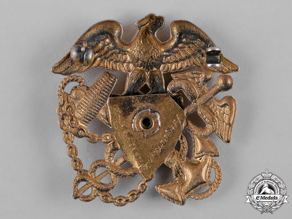 united_states._a_united_states_navy_side_cap_badge,_by_vanguard_c19-2863