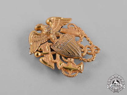 united_states._a_united_states_navy_side_cap_badge,_by_vanguard_c19-2864