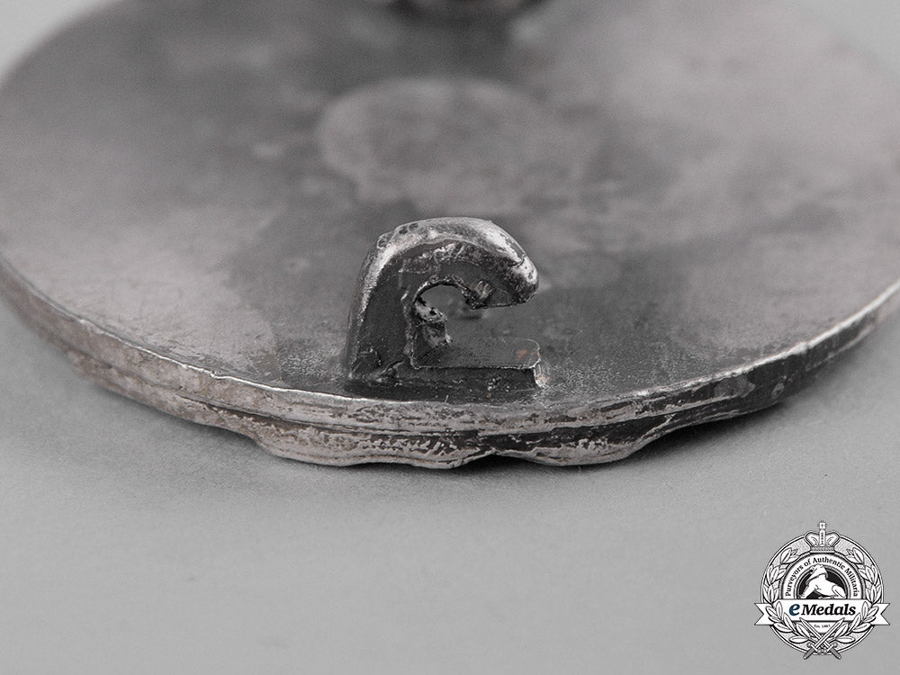 germany,_wehrmacht._a_wound_badge,_silver_grade,_by_eugen_schmidthäussler_c19-3013