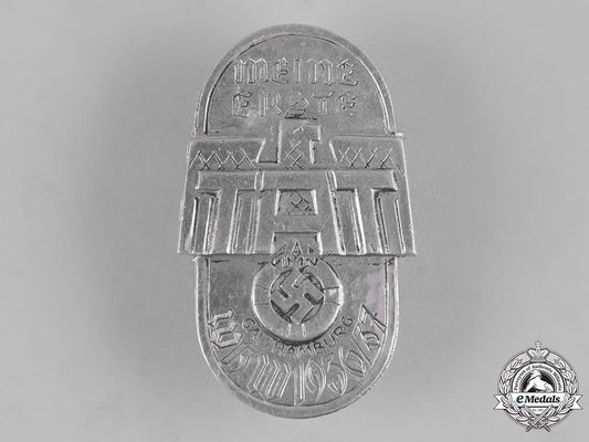 germany,_third_reich._a1936/1937_district_hamburg_winter_relief_of_the_german_people_my_first_donation_badge_by_carl_wild_c19-3092_1_1_1