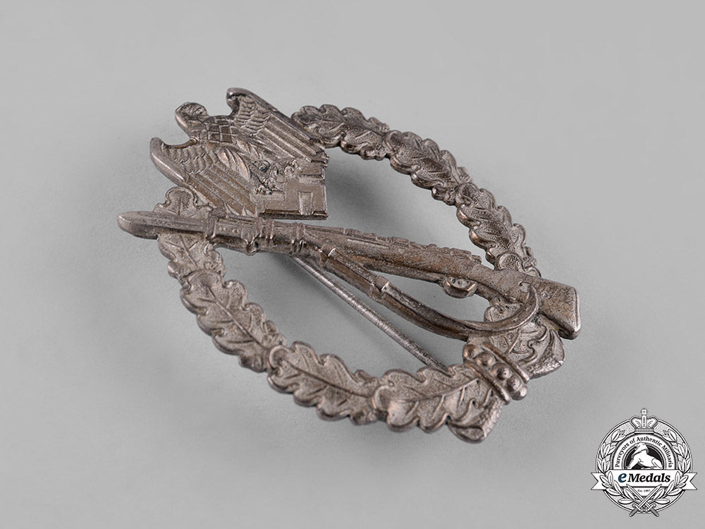 germany,_wehrmacht._a_infantry_assault_badge_in_silver,_by_deschler&_sohn_c19-3606_1