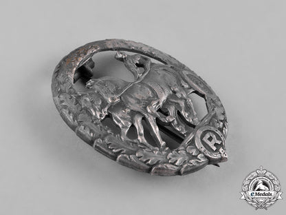germany,_third_reich._a_horse_driver’s_badge,_silver_grade,_by_steinhauer&_lück_c19-363