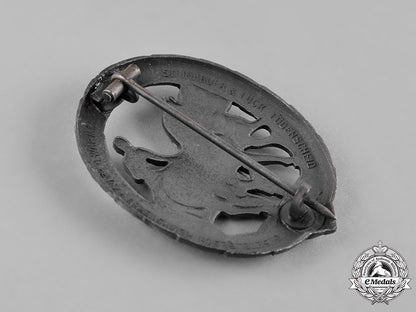 germany,_third_reich._a_horse_driver’s_badge,_silver_grade,_by_steinhauer&_lück_c19-364