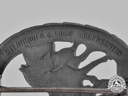 germany,_third_reich._a_horse_driver’s_badge,_silver_grade,_by_steinhauer&_lück_c19-367