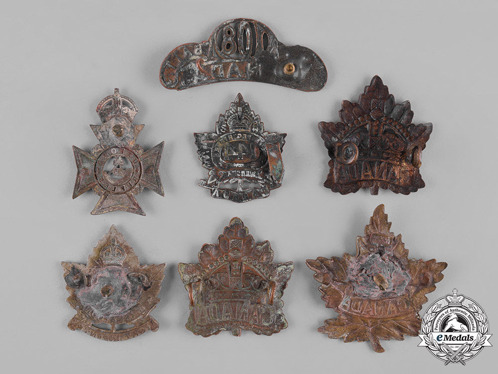 canada,_united_kingdom._a_lot_of_seven_first_war_cap_badges_c19-4165