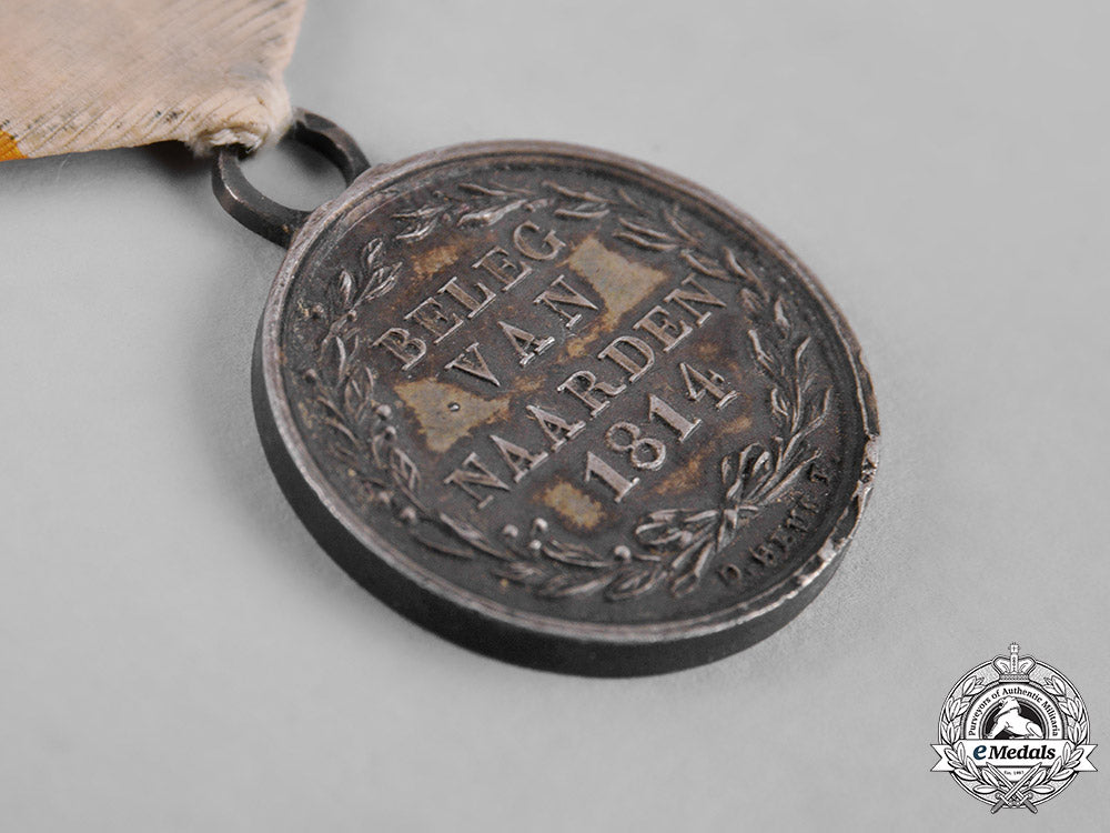 netherlands,_french_empire._a_medal_for_the_siege_of_naarden,_silver_medal,_by_d._heus_f.,_c.1814_c19-5497