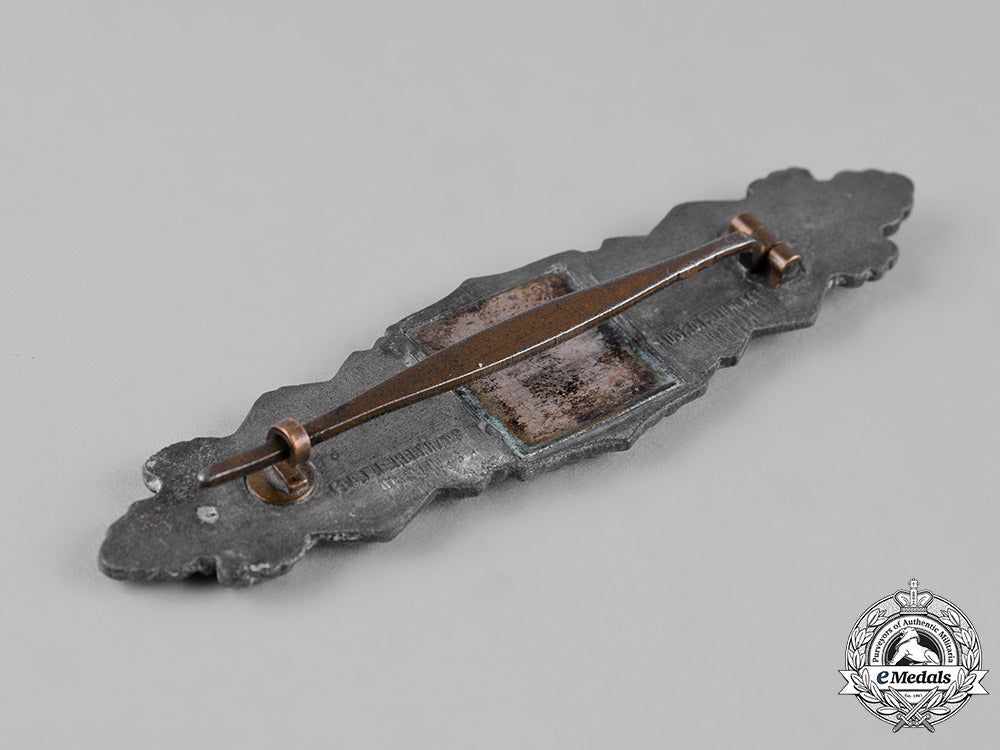 germany,_wehrmacht._a_close_combat_clasp,_silver_grade,_by_c.e._juncker_c19-5712_1_1