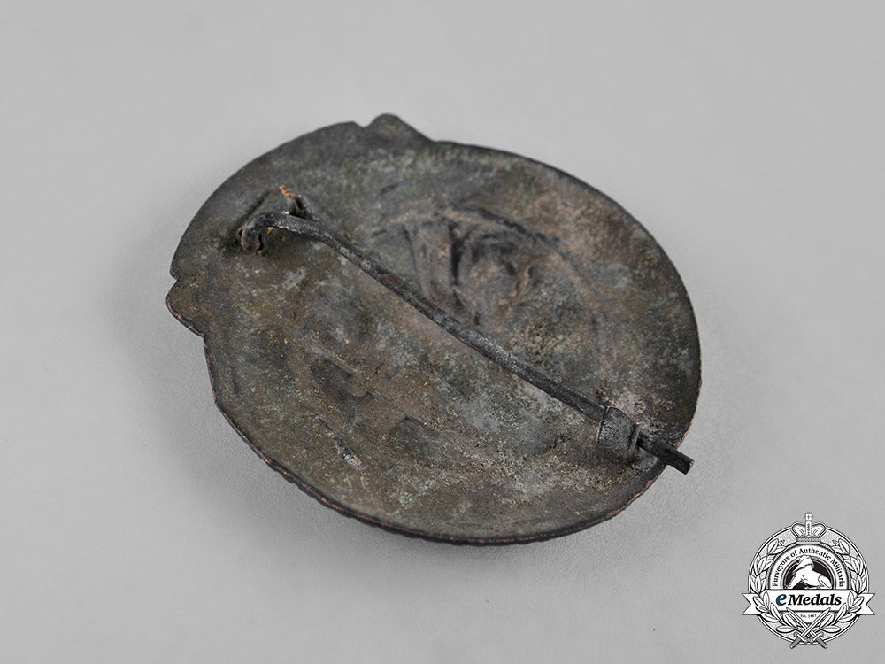 germany,_nskk._a_badge_for_dutch_eastern_front_volunteers_in_the_nskk_c19-5787_2_1