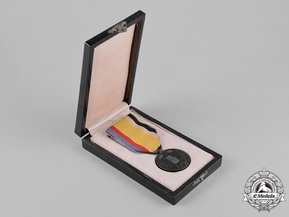 manchukuo,_japanese_occupation._a_national_foundation_merit_medal_c19-6279_1_1