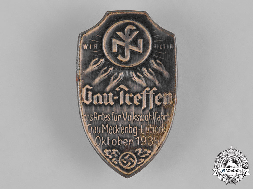 germany,_third_reich._a1935_district_meeting_of_the_national_socialist_people’s_welfare_organization_badge_c19-7848