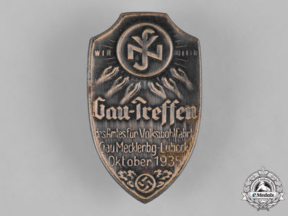 germany,_third_reich._a1935_district_meeting_of_the_national_socialist_people’s_welfare_organization_badge_c19-7848