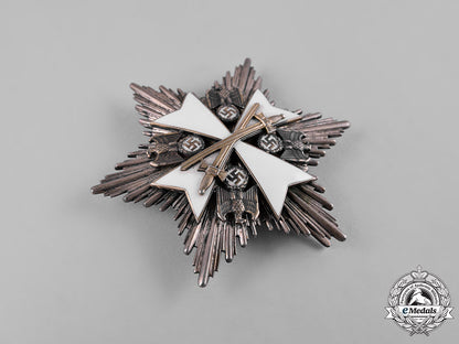 germany,_third_reich._an_order_of_the_german_eagle,_breast_star_with_swords,_by_gebrüder_godet_c19-8029