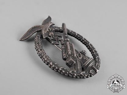 germany,_luftwaffe._a_flak_badge_with_case_of_issue_c19-804_2