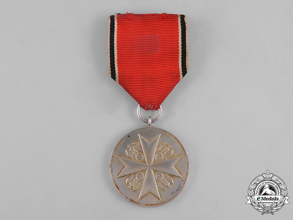 germany,_third_reich._an_order_of_the_german_eagle,_merit_medal_in_silver,_by_the_official_berlin_mint_c19-8521_2_1_2_1_2