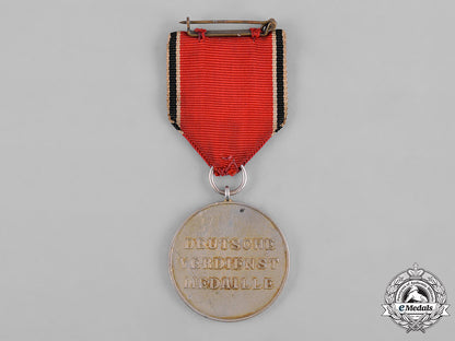 germany,_third_reich._an_order_of_the_german_eagle,_merit_medal_in_silver,_by_the_official_berlin_mint_c19-8522_2_1_2_1_2