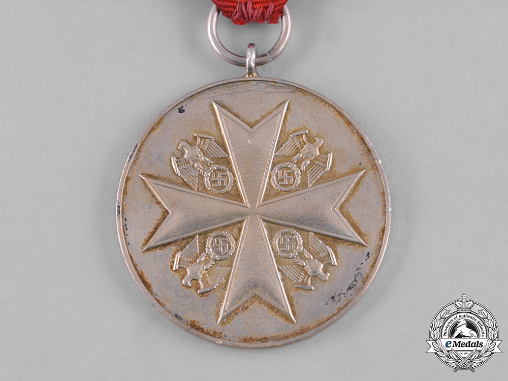 germany,_third_reich._an_order_of_the_german_eagle,_merit_medal_in_silver,_by_the_official_berlin_mint_c19-8523_2_1_2_1_2