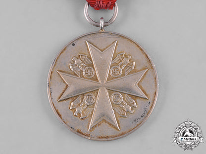 germany,_third_reich._an_order_of_the_german_eagle,_merit_medal_in_silver,_by_the_official_berlin_mint_c19-8523_2_1_2_1_2