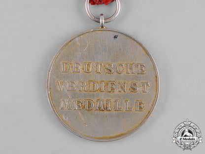 germany,_third_reich._an_order_of_the_german_eagle,_merit_medal_in_silver,_by_the_official_berlin_mint_c19-8524_2_1_2_1_2
