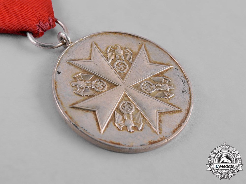 germany,_third_reich._an_order_of_the_german_eagle,_merit_medal_in_silver,_by_the_official_berlin_mint_c19-8525_1_1_2_1_2