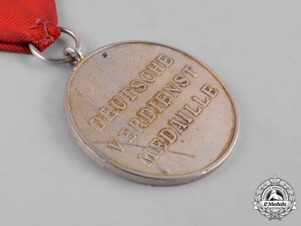 germany,_third_reich._an_order_of_the_german_eagle,_merit_medal_in_silver,_by_the_official_berlin_mint_c19-8526_1_1_2_1_2