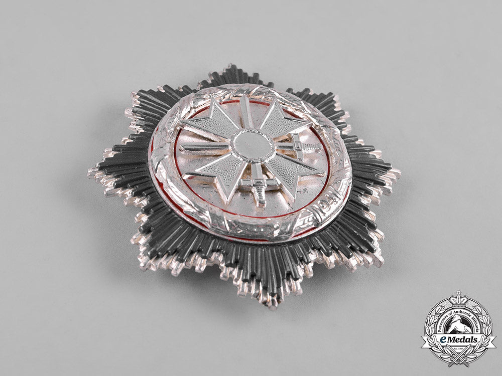 germany,_wehrmacht._a_german_cross_in_silver,_post-1957_reissue_c19-8622
