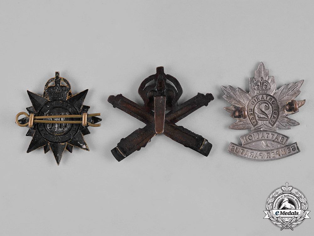 canada._a_lot_of_three_first_war_era_cap_badges_c19-9326
