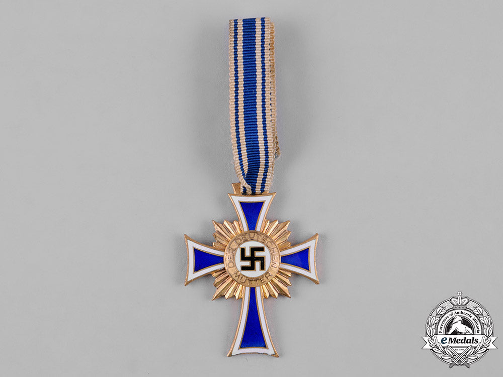 germany,_third_reich._an_honour_cross_of_the_german_mother,_gold_grade_with_miniature_c19_0800