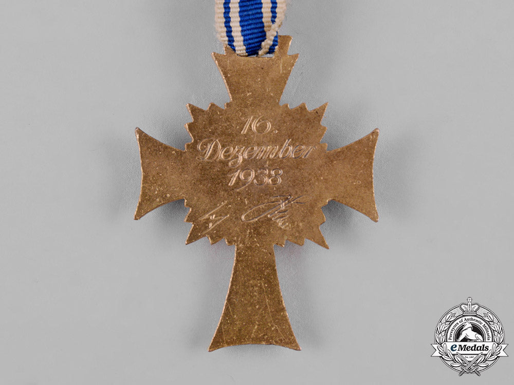 germany,_third_reich._an_honour_cross_of_the_german_mother,_gold_grade_with_miniature_c19_0802