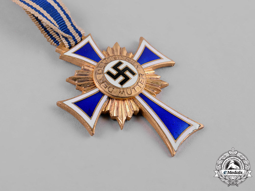 germany,_third_reich._an_honour_cross_of_the_german_mother,_gold_grade_with_miniature_c19_0803