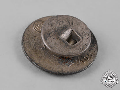 germany,_nsdap._a_party_member’s_buttonhole_badge,_by_hermann_aurich_c19_1422