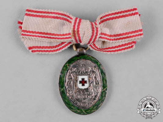 austria,_imperial._an_austrian_women’s_red_cross_lapel_badge_c19_1527