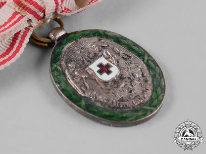 austria,_imperial._an_austrian_women’s_red_cross_lapel_badge_c19_1529
