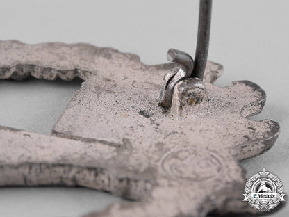 germany,_wehrmacht._a_silver_grade_infantry_assault_badge,_by_gebrüder_wegerhoff_c19_1597