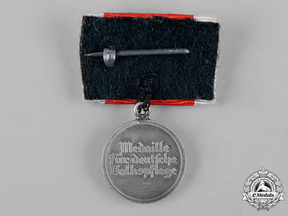 germany,_third_reich._a_social_welfare_decoration_ribbon_bar_with_miniature_c19_2041