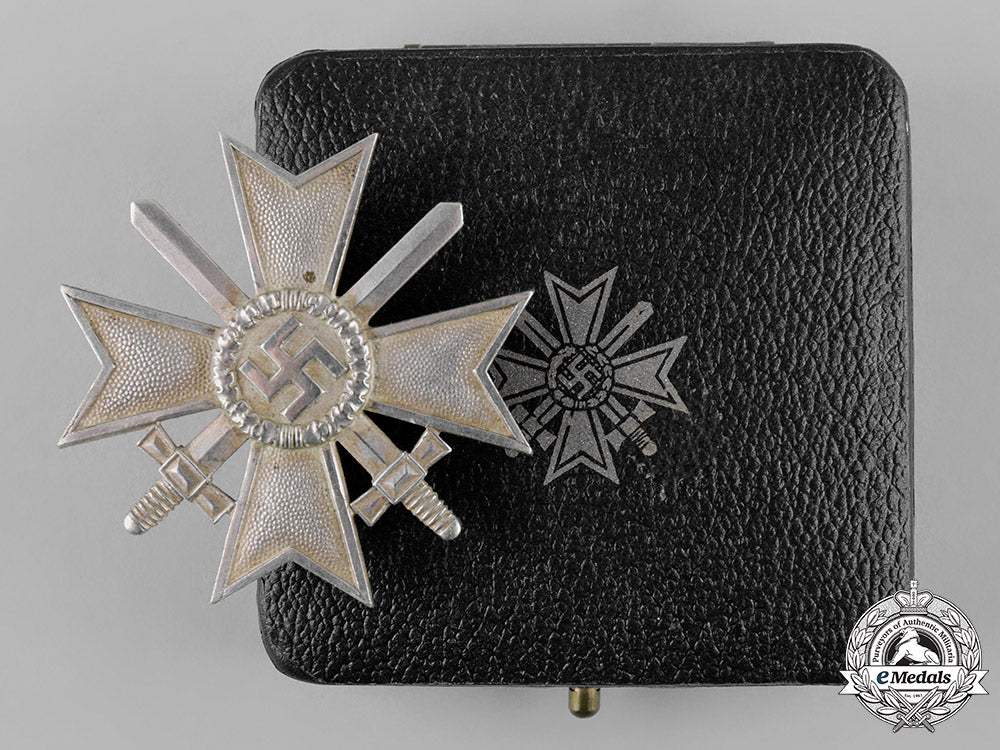 germany,_wehrmacht._a_cased_war_merit_cross,_i_class_with_swords,_by_deschler&_sohn_c19_2062