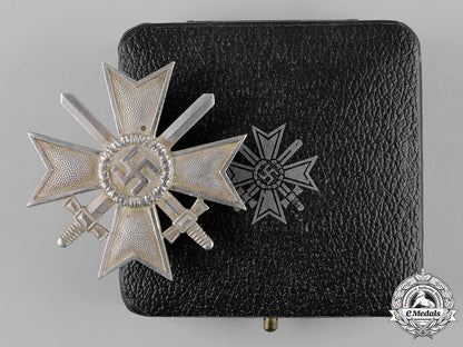 germany,_wehrmacht._a_cased_war_merit_cross,_i_class_with_swords,_by_deschler&_sohn_c19_2062