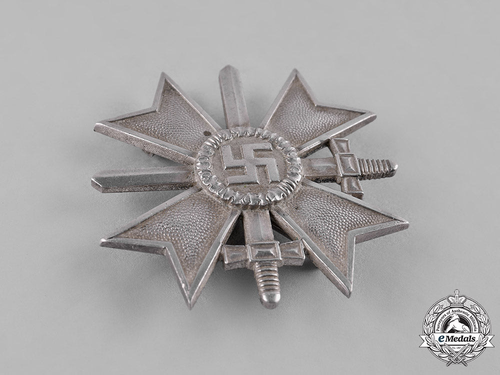 germany,_wehrmacht._a_cased_war_merit_cross,_i_class_with_swords,_by_deschler&_sohn_c19_2065
