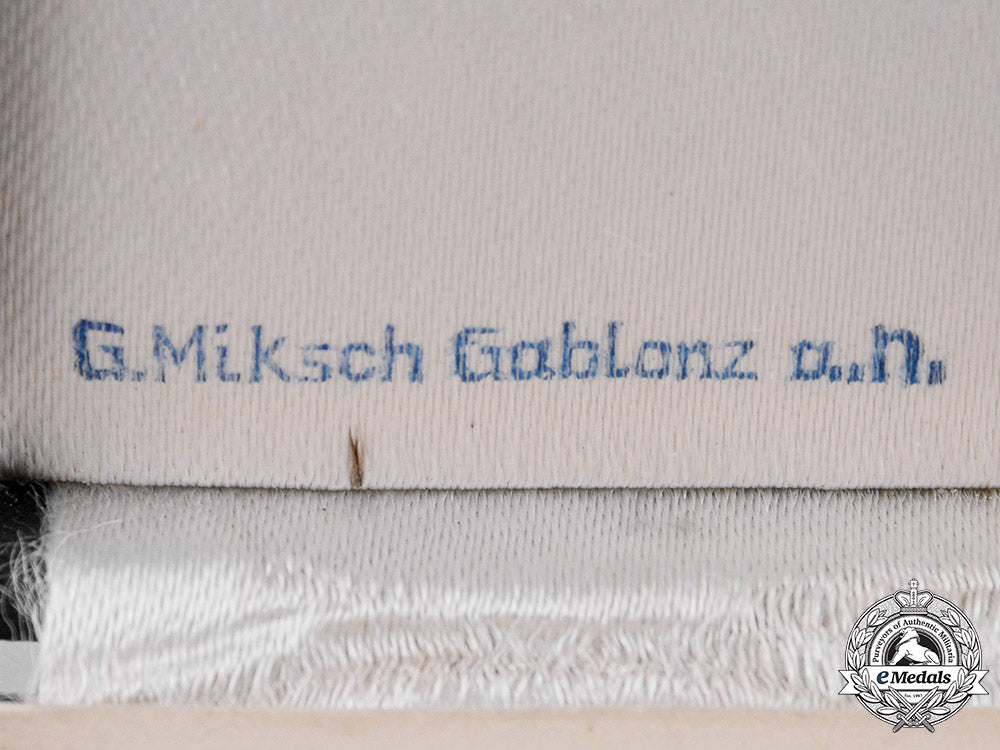 germany,_third_reich._a_cased_honour_cross_of_the_german_mother,_gold_grade,_by_gustav_miksch_c19_2145