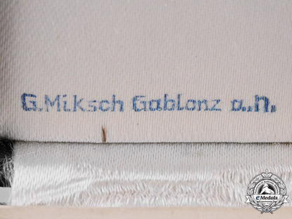 germany,_third_reich._a_cased_honour_cross_of_the_german_mother,_gold_grade,_by_gustav_miksch_c19_2145