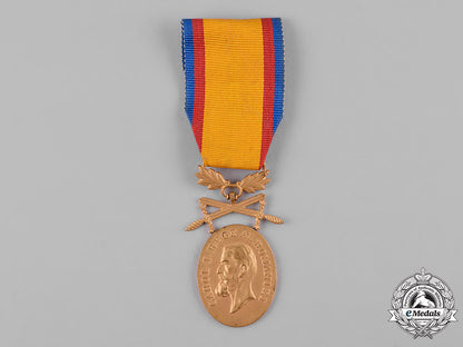 romania,_kingdom._a_medal_for_manhood_and_loyalty_with_crossed_swords,_i_class_c19_2993