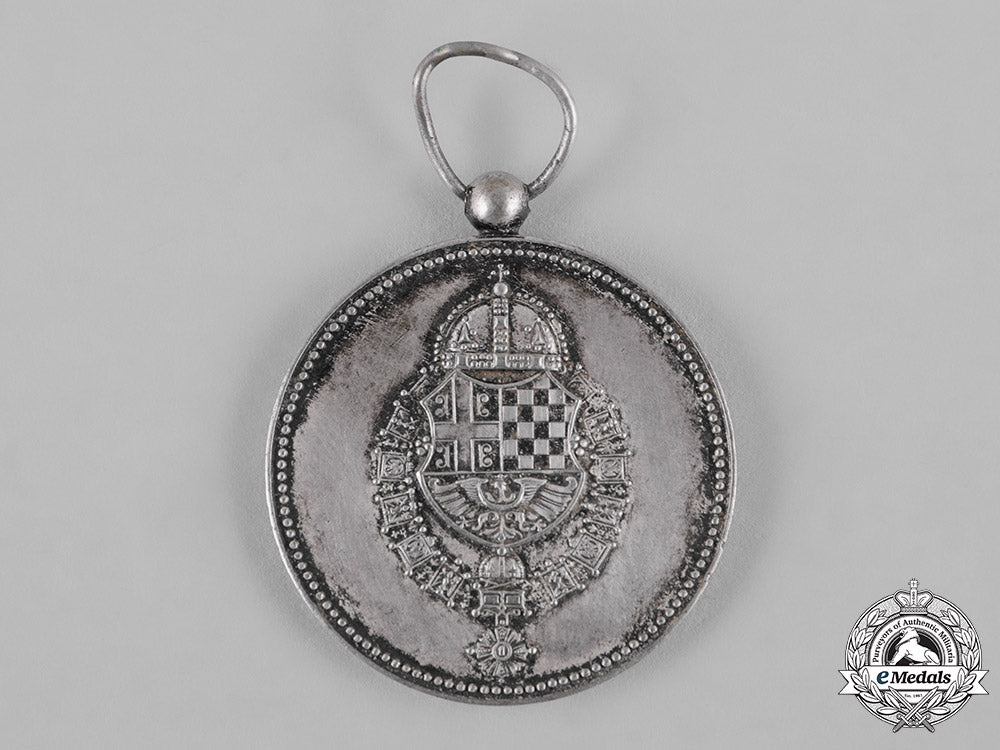 yugoslavia,_kingdom._a_medal_for_service_to_the_royal_household,_iv_class,_silver_grade,_c.1941_c19_3775_1