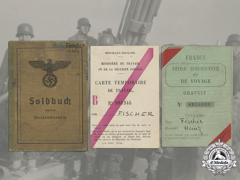 germany,_heer._a_soldbuch&_documents_to_artillery_gunner_heinz_fischer(_battle_of_the_bulge)_c19_4278