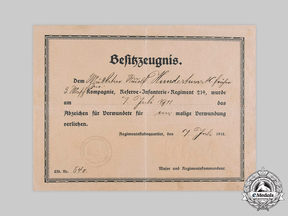 germany,_imperial._a_wound_badge_in_black_certificate_to_musketeer_hundertmark,1918_c20091_emd4585_1