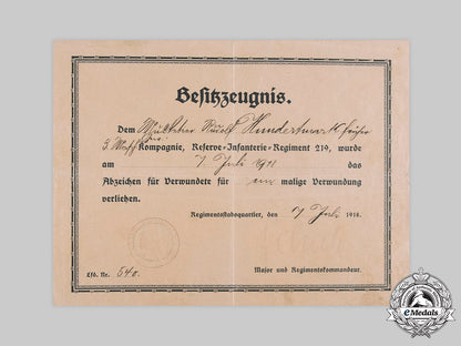 germany,_imperial._a_wound_badge_in_black_certificate_to_musketeer_hundertmark,1918_c20091_emd4585_1